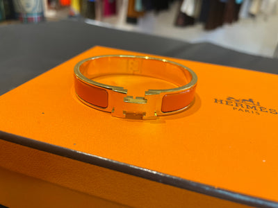 Hermes Enamel Narrow Clic Clac H Bracelet in orange RTP £560