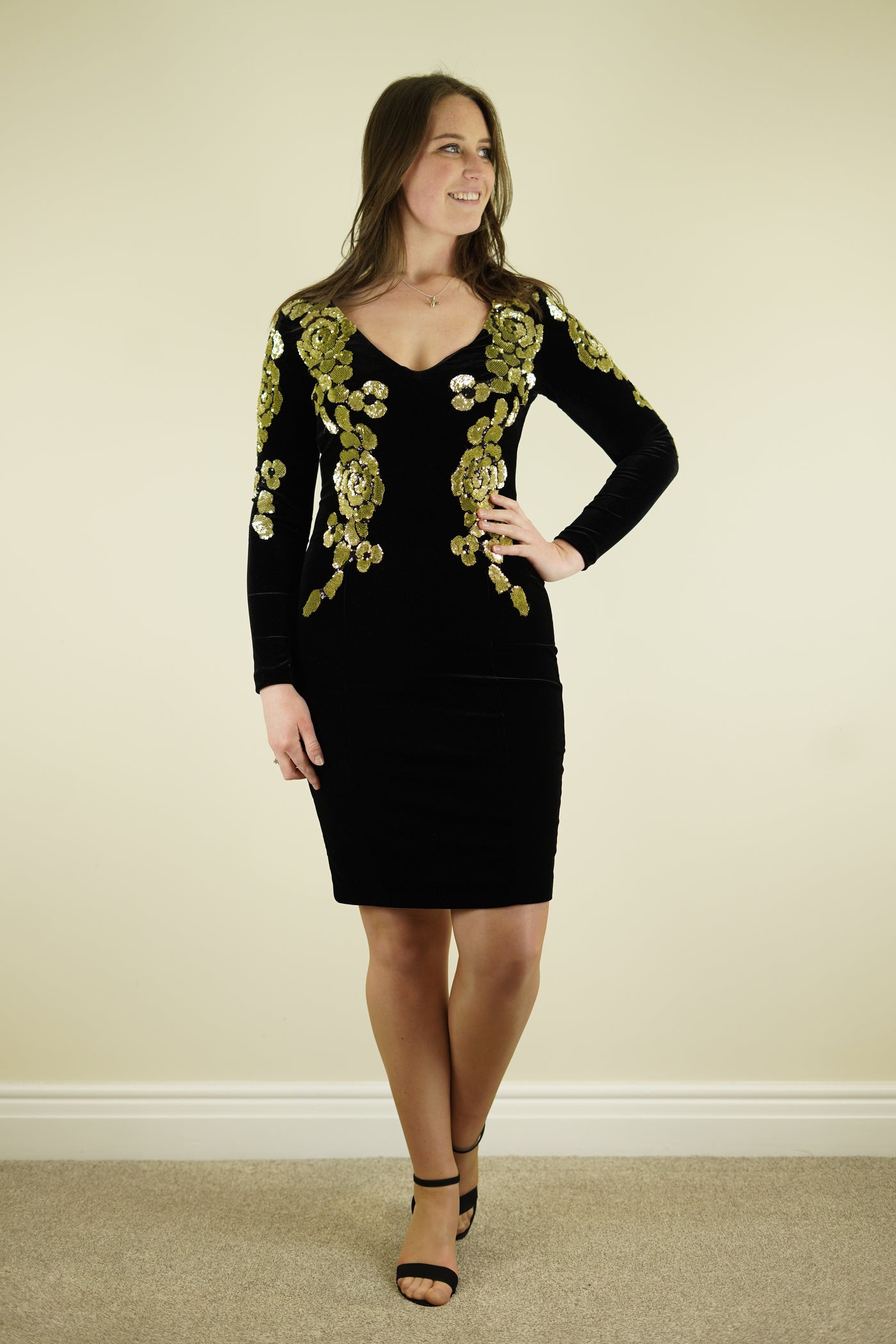 Nissa black midi dress with long sleeves and gold sequence
