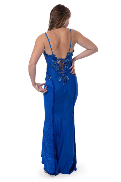 Royal blue catwalk collection evening gown with shoulder jacket